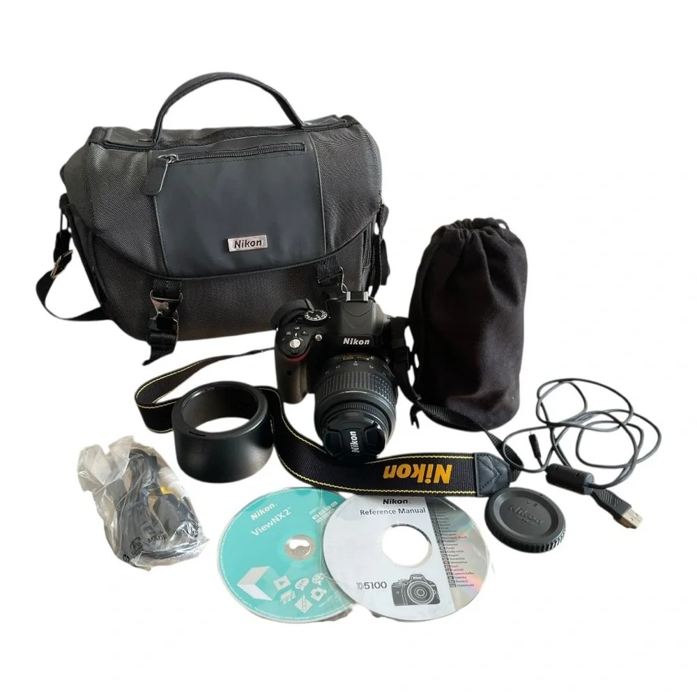 Nikon D5100 DSLR Camera Bundle with 18–55mm and 55–300mm Lenses + Accessories